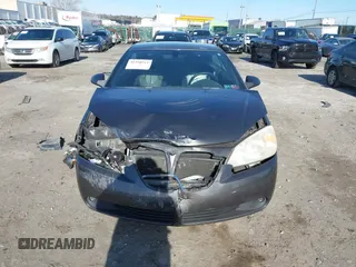 2007 Pontiac G6 GT with VIN 1G2ZH361074105839, listed as a IAAI auction lot 41598911 with 83,021 mi miles and . Bid and sale history available at DreamBid. Image 13.