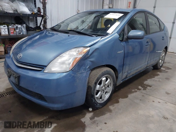 2007 Toyota Prius z VIN JTDKB20U477559103, wystawiony jako IAAI lot #41957891 z przebiegiem 285 452 mil mil oraz . Historia ofert i sprzedaży dostępna na DreamBid. Obrazek 2.