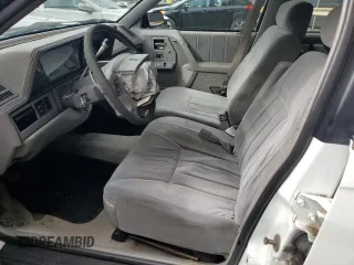 1996 Oldsmobile Cutlass Ciera 1SA VX5 z VIN 1G3AJ55M0T6399357, wystawiony jako Copart lot #60722234 z przebiegiem 128 495 mil mil oraz Szkody całkowita. Historia ofert i sprzedaży dostępna na DreamBid. Obrazek 7.