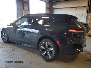 2023 BMW iX xDrive50 with VIN WB523CF08PCM77367, listed as a Copart auction lot 43043695 with 17,213 mi miles and Salvage Title. Bid and sale history available at carsss.com. Image 2.