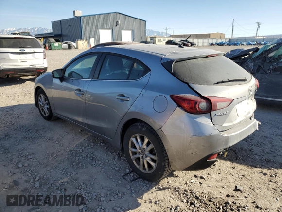 2014 Mazda 3 i Touring with VIN JM1BM1L73E1111512, listed as a Copart auction lot 42344565 with 140,139 mi miles and Salvage title. Bid and sale history available at DreamBid. Image 2.