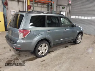 2009 Subaru Forester X with VIN JF2SH63639H762260, listed as a IAAI auction lot 41904457 with 197,913 mi miles and . Bid and sale history available at DreamBid. Image 4.