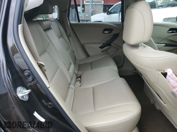 2017 Acura RDX Advance with VIN 5J8TB4H75HL032955, listed as a Copart auction lot 68704004 with 103,090 mi miles and Salvage Title. Bid and sale history available at DreamBid. Image 12.