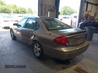 2003 Ford Taurus SE Standard with VIN 1FAFP53U13G229161, listed as a IAAI auction lot 39753697 with 94,195 mi miles. Bid and sale history available at carsss.com. Image 3.