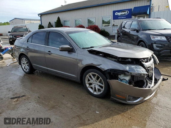2012 Ford Fusion SEL z VIN 3FAHP0JA3CR106622, wystawiony jako Copart lot #56330425 z przebiegiem 120 880 mil mil oraz Szkoda całkowita • Salvage title. Historia ofert i sprzedaży dostępna na DreamBid. Obrazek 4.