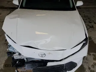 2025 Toyota Camry LE with VIN 4T1DAACK4SU048688, listed as a Copart auction lot 48295745 with 9,999 mi miles and Salvage Title. Bid and sale history available at carsss.com. Image 12.
