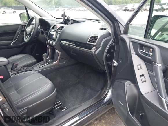 2018 Subaru Forester Touring with VIN JF2SJAWC2JH492788, listed as a IAAI auction lot 42358591 with 83,354 mi miles and . Bid and sale history available at DreamBid. Image 5.