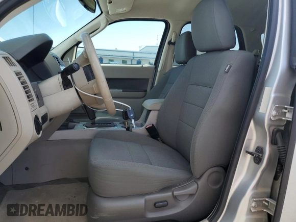 2009 Ford Escape Hybrid z VIN 1FMCU49399KD02275, wystawiony jako Copart lot #55536955 z przebiegiem 50 333 mil mil oraz Szkoda całkowita • Salvage title. Historia ofert i sprzedaży dostępna na DreamBid. Obrazek 7.