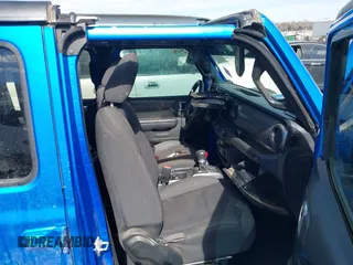 2023 Jeep Wrangler Sport S with VIN 1C4HJXDN6PW592915, listed as a IAAI auction lot 41662077 with 43,129 mi miles and . Bid and sale history available at DreamBid. Image 5.