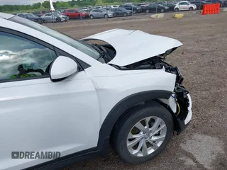 2019 Hyundai Tucson Value z VIN KM8J33A41KU013023, wystawiony jako IAAI lot #42302643 z przebiegiem 41 231 mil mil oraz . Historia ofert i sprzedaży dostępna na DreamBid. Obrazek 6.