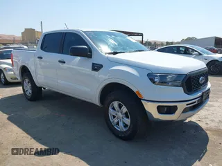2021 Ford Ranger XL z VIN 1FTER4EH5MLE05003, wystawiony jako IAAI lot #42649042 z przebiegiem 62 571 mil mil oraz . Historia ofert i sprzedaży dostępna na DreamBid. Obrazek 1.
