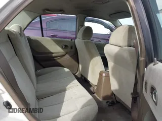 2000 Mazda Protege DX with VIN JM1BJ2221Y0208156, listed as a IAAI auction lot 41609657 with 435,304 mi miles and . Bid and sale history available at DreamBid. Image 8.