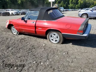 1986 Alfa Romeo Spider Veloce z VIN ZARBA5417G1036669, wystawiony jako Copart lot #83489434 z przebiegiem 71 219 mil mil oraz Czysty tytuł • Clean title. Historia ofert i sprzedaży dostępna na DreamBid. Obrazek 2.