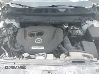 2021 Mazda CX-9 Touring with VIN JM3TCACY9M0526376, listed as a IAAI auction lot 42264478 with 74,671 mi miles and . Bid and sale history available at DreamBid. Image 10.