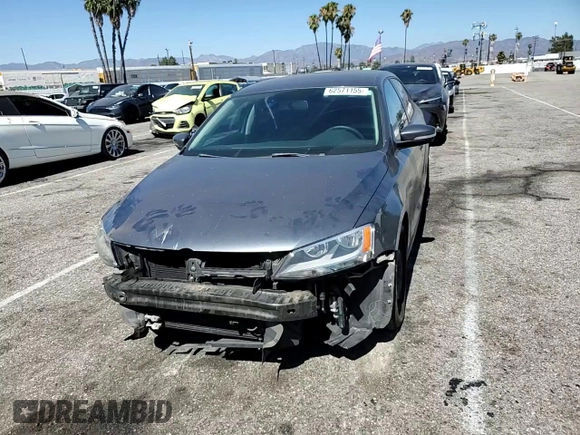 2014 Volkswagen Jetta SE with VIN 3VWD17AJ2EM322087, listed as a Copart auction lot 62571155 with 71,884 mi miles and Salvage title. Bid and sale history available at DreamBid. Image 13.