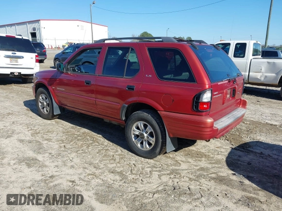 2001 Isuzu Rodeo S with VIN 4S2CK58W814326849, listed as a IAAI auction lot 41769624 with 366,460 mi miles and . Bid and sale history available at DreamBid. Image 3.