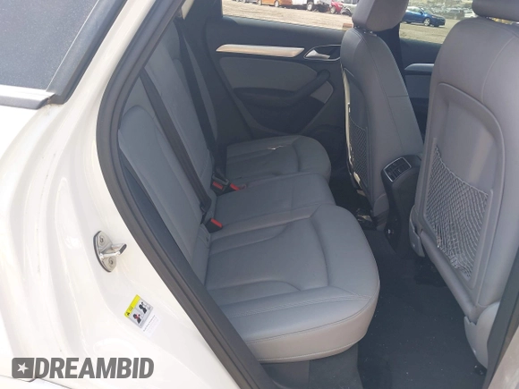 2018 Audi Q3 Premium with VIN WA1ECCFS3JR016577, listed as a IAAI auction lot 42177891 with 91,876 mi miles and . Bid and sale history available at DreamBid. Image 8.