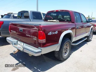 2003 Dodge Dakota SLT with VIN 1D7HG48N43S256520, listed as a IAAI auction lot 42111997 with 218,061 mi miles and . Bid and sale history available at carsss.com. Image 4.