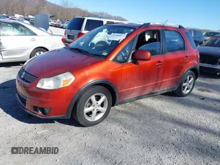 2009 Suzuki SX4 Touring AWD with VIN JS2YB417595100925, listed as a IAAI auction lot 41693882 with 76,972 mi miles and . Bid and sale history available at DreamBid. Image 2.