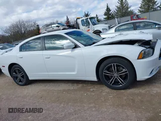 2014 Dodge Charger SXT with VIN 2C3CDXJG9EH255078, listed as a IAAI auction lot 41880363 with 124,864 mi miles. Bid and sale history available at carsss.com. Image 13.