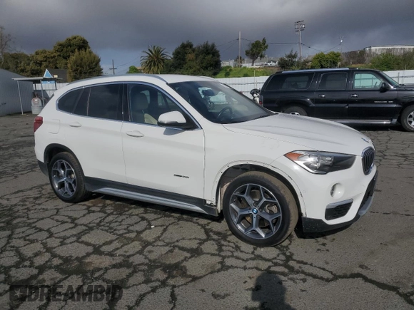 2017 BMW X1 sDrive28i with VIN WBXHU7C33H5H32827, listed as a Copart auction lot 50348265 with 117,412 mi miles and Salvage Title. Bid and sale history available at carsss.com. Image 4.