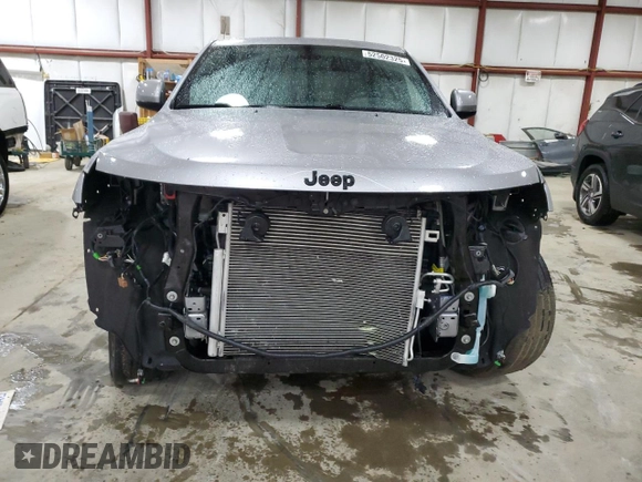 2021 Jeep Grand Cherokee Laredo E with VIN 1C4RJFAG3MC775884, listed as a Copart auction lot 52502325 with 59,368 mi miles and Salvage title. Bid and sale history available at DreamBid. Image 5.