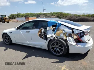 2021 Tesla Model S Plaid с VIN 5YJSA1E66MF453717, выставлен на аукционе Copart как лот 49330355 с пробегом 64 458 миль миль и Списание • Salvage title. История ставок и продаж доступна на DreamBid. Изображение 2.