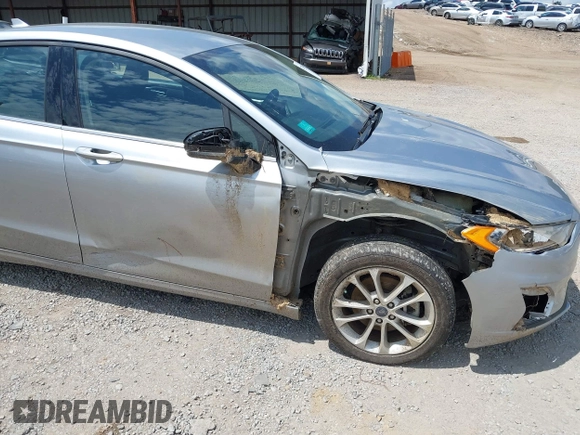 2020 Ford Fusion SE with VIN 3FA6P0LU4LR212740, listed as a IAAI auction lot 42374044 with 146,927 mi miles and . Bid and sale history available at DreamBid. Image 6.