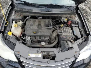 2010 Chrysler Sebring Limited with VIN 1C3CC5FB2AN120496, listed as a Copart auction lot 82131024 with 106,563 mi miles and Salvage Title. Bid and sale history available at carsss.com. Image 11.