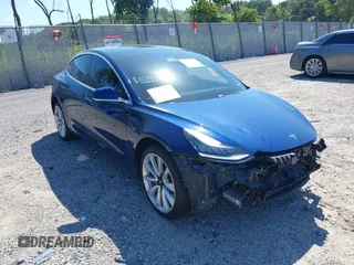 2019 Tesla Model 3 Mid Range with VIN 5YJ3E1EA6KF402308, listed as a IAAI auction lot 40077902 with 89,794 mi miles. Bid and sale history available at carsss.com. Image 1.