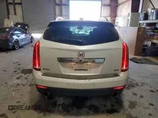 2015 Cadillac SRX Luxury Collection z VIN 3GYFNBE38FS618933, wystawiony jako Copart lot #45332835 z przebiegiem 64 819 mil mil oraz Szkody całkowita. Historia ofert i sprzedaży dostępna na DreamBid. Obrazek 6.