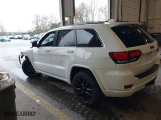 2019 Jeep Grand Cherokee Laredo E with VIN 1C4RJFAG1KC818289, listed as a IAAI auction lot 41602541 with 59,356 mi miles. Bid and sale history available at carsss.com. Image 3.