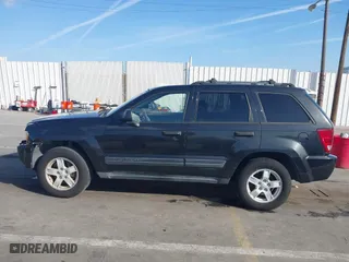 2005 Jeep Grand Cherokee Laredo with VIN 1J8GS48K95C615330, listed as a IAAI auction lot 41719101 with 152,186 mi miles. Bid and sale history available at carsss.com. Image 14.