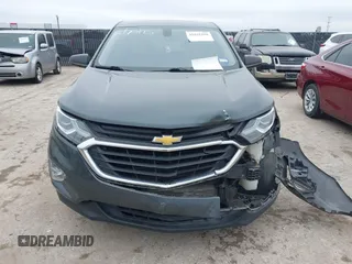 2018 Chevrolet Equinox LS with VIN 3GNAXHEV7JS640663, listed as a IAAI auction lot 41631256 with 141,224 mi miles and . Bid and sale history available at DreamBid. Image 12.