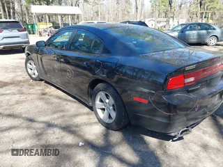 2014 Dodge Charger SE with VIN 2C3CDXBG3EH129796, listed as a IAAI auction lot 41773595 with 172,990 mi miles and . Bid and sale history available at DreamBid. Image 3.