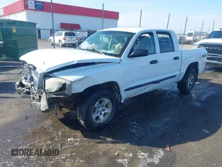 2005 Dodge Dakota SLT with VIN 1D7HW48N85S226460, listed as a IAAI auction lot 41568128 with 213,159 mi miles and . Bid and sale history available at carsss.com. Image 22.