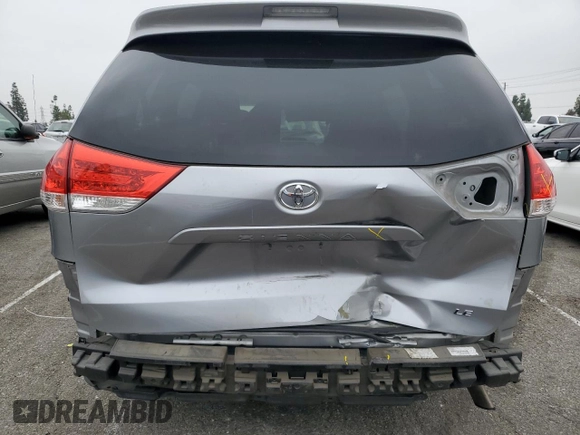 2012 Toyota Sienna with VIN 5TDKA3DC4CS014867, listed as a Copart auction lot 43191655 with 169,517 mi miles and Salvage Title. Bid and sale history available at DreamBid. Image 6.
