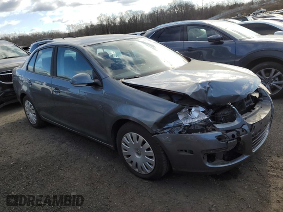 2009 Volkswagen Jetta z VIN 3VWHZ71KX9M011693, wystawiony jako Copart lot #87076904 z przebiegiem 157 478 mil mil oraz Szkoda całkowita • Salvage title. Historia ofert i sprzedaży dostępna na DreamBid. Obrazek 4.
