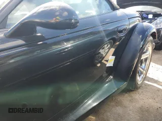 1999 Plymouth Prowler z VIN 1P3EW65G7XV503356, wystawiony jako Copart lot #74829624 z przebiegiem Nie podano mil oraz Nie do naprawy. Historia ofert i sprzedaży dostępna na DreamBid. Obrazek 12.