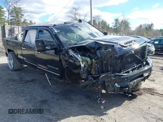 2019 GMC Sierra 2500HD Denali z VIN 1GT12SEY3KF232018, wystawiony jako IAAI lot #41897434 z przebiegiem Nie podano mil oraz . Historia ofert i sprzedaży dostępna na DreamBid. Obrazek 1.