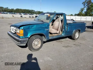 1992 Ford Ranger with VIN 1FTCR10A3NTA81065, listed as a Copart auction lot 74002434 with 9,827 mi miles and Salvage Title. Bid and sale history available at carsss.com. Image 1.