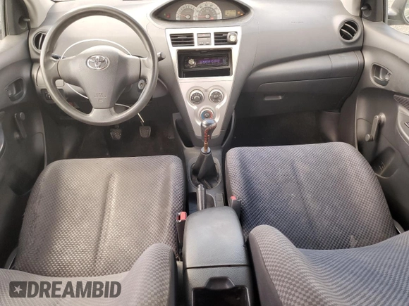 2007 Toyota Yaris with VIN JTDBT903571125580, listed as a Copart auction lot 56263915 with 180,024 mi miles and Clean Title. Bid and sale history available at DreamBid. Image 8.