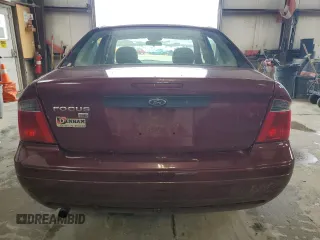 2007 Ford Focus S z VIN 1FAFP34N77W249390, wystawiony jako Copart lot #61817215 z przebiegiem 112 295 mil mil oraz Szkoda całkowita • Salvage title. Historia ofert i sprzedaży dostępna na DreamBid. Obrazek 6.