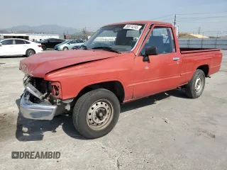 1987 Toyota Pickup with VIN JT4RN50R5H0241102, listed as a Copart auction lot 50074245 with 201,590 mi miles and Salvage Title. Bid and sale history available at DreamBid. Image 1.