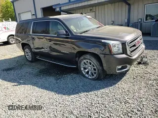 2017 GMC Yukon XL SLT z VIN 1GKS1GKC0HR329962, wystawiony jako Copart lot #51134115 z przebiegiem 69 556 mil mil oraz Szkoda całkowita • Salvage title. Historia ofert i sprzedaży dostępna na DreamBid. Obrazek 11.