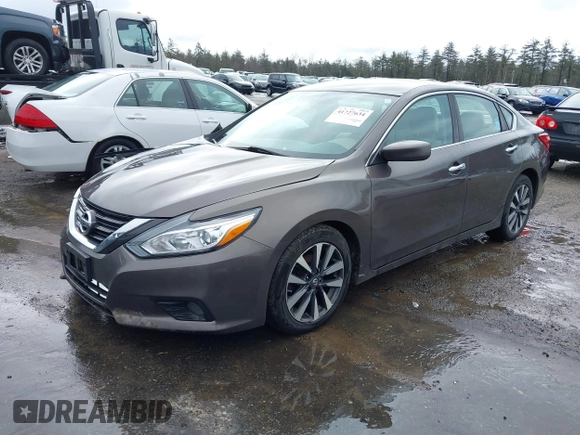 2016 Nissan Altima S with VIN 1N4AL3APXGC266407, listed as a IAAI auction lot 41727634 with 127,936 mi miles and . Bid and sale history available at DreamBid. Image 18.