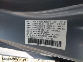 2006 Honda CR-V LX with VIN JHLRD68516C006561, listed as a IAAI auction lot 41855457 with 215,139 mi miles. Bid and sale history available at carsss.com. Image 9.