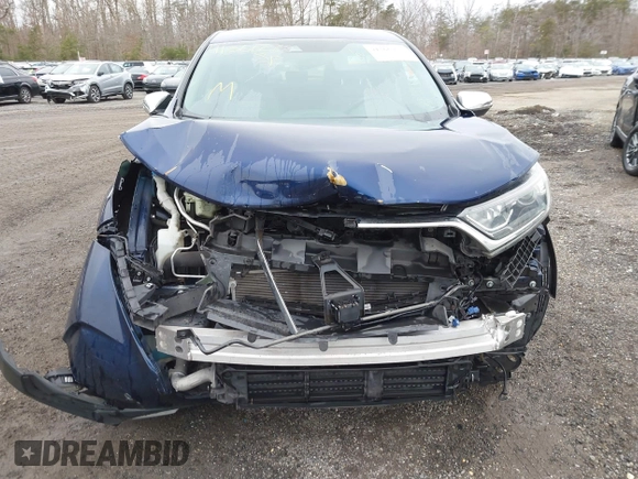 2019 Honda CR-V EX with VIN 2HKRW2H54KH630921, listed as a IAAI auction lot 41366277 with 103,075 mi miles and . Bid and sale history available at DreamBid. Image 6.