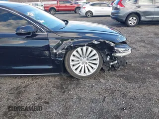 2015 Audi A8 L 4.0T with VIN WAU32AFD4FN014063, listed as a IAAI auction lot 41501970 with 158,570 mi miles. Bid and sale history available at carsss.com. Image 6.