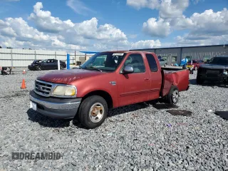2000 Ford F-150 XL with VIN 1FTRX17W3YNB80866, listed as a Copart auction lot 61151005 with Not provided miles and Salvage title. Bid and sale history available at DreamBid. Image 1.